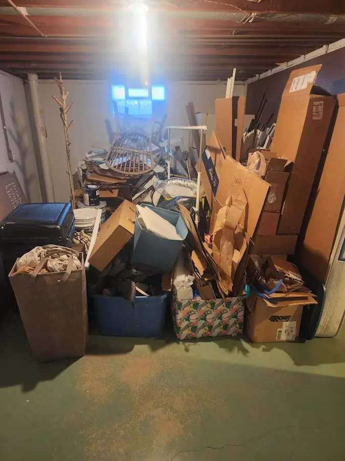 Roll-off dumpster container at job site for Cleanout Dumpster Rental in Avondale Estates